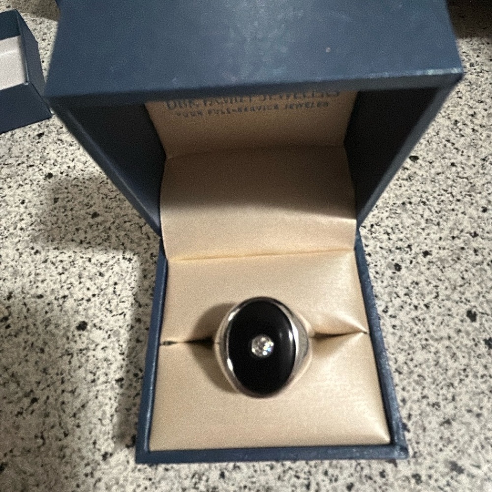 Solid sterling silver ring with black onyx and a genuine .10ct diamond
